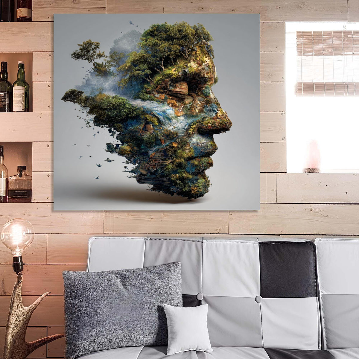 Abstract art of a face made of nature on a wall above a sofa.