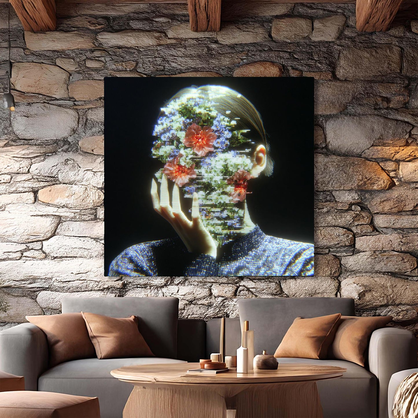 Modern living room with a stone wall, gray sofa, and abstract painting.