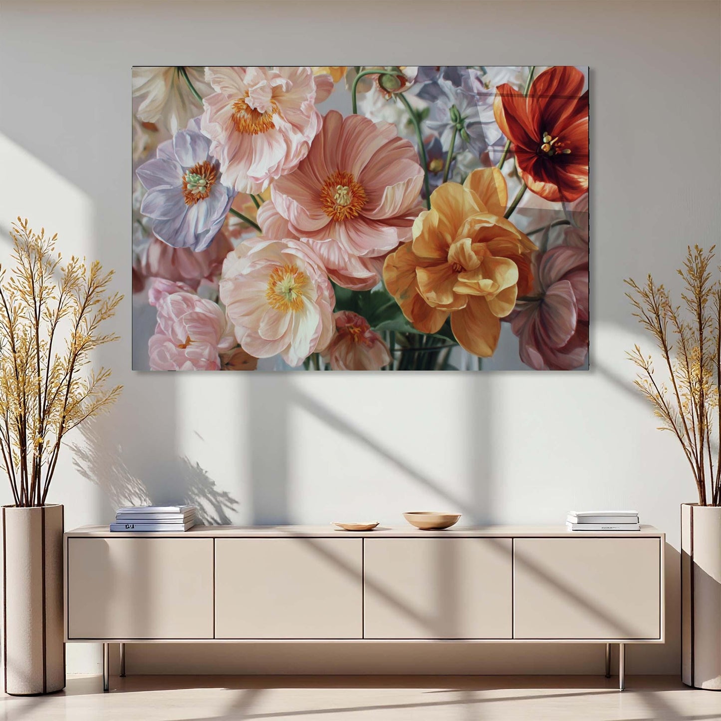Floral painting above a beige console table with decorative plants on either side.
