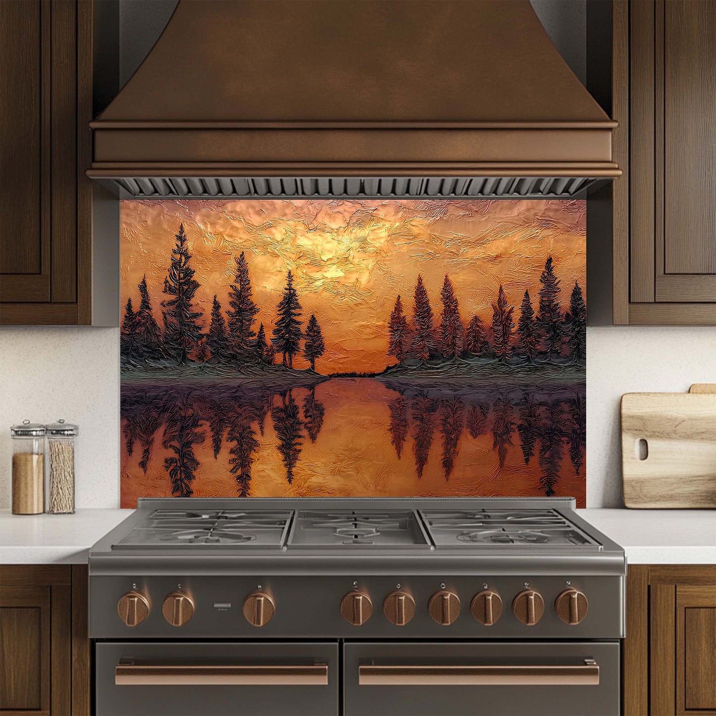 Kitchen stove with a decorative glass backsplash featuring a sunset over trees design.