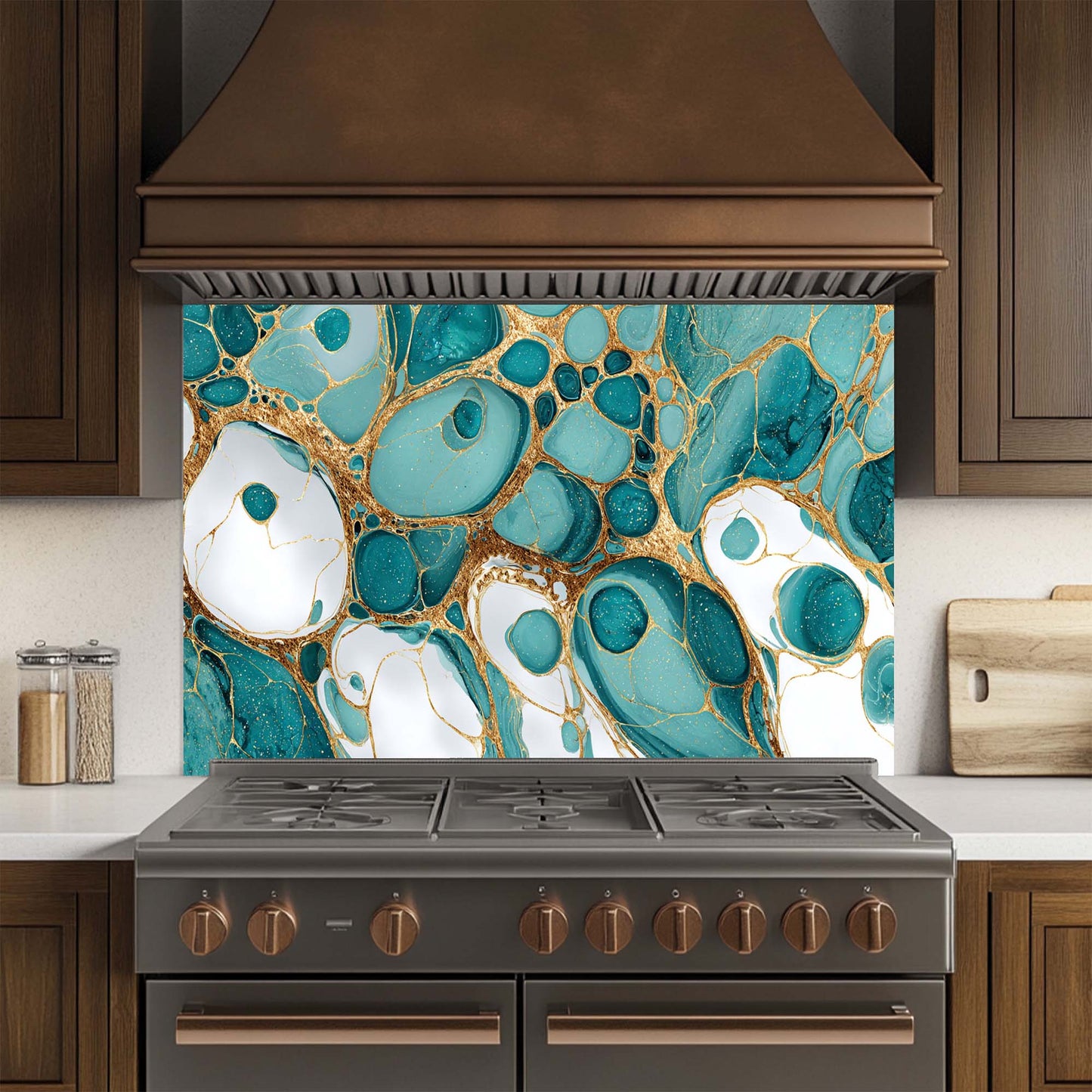 Kitchen stove with a decorative glass backsplash featuring teal and gold abstract design.
