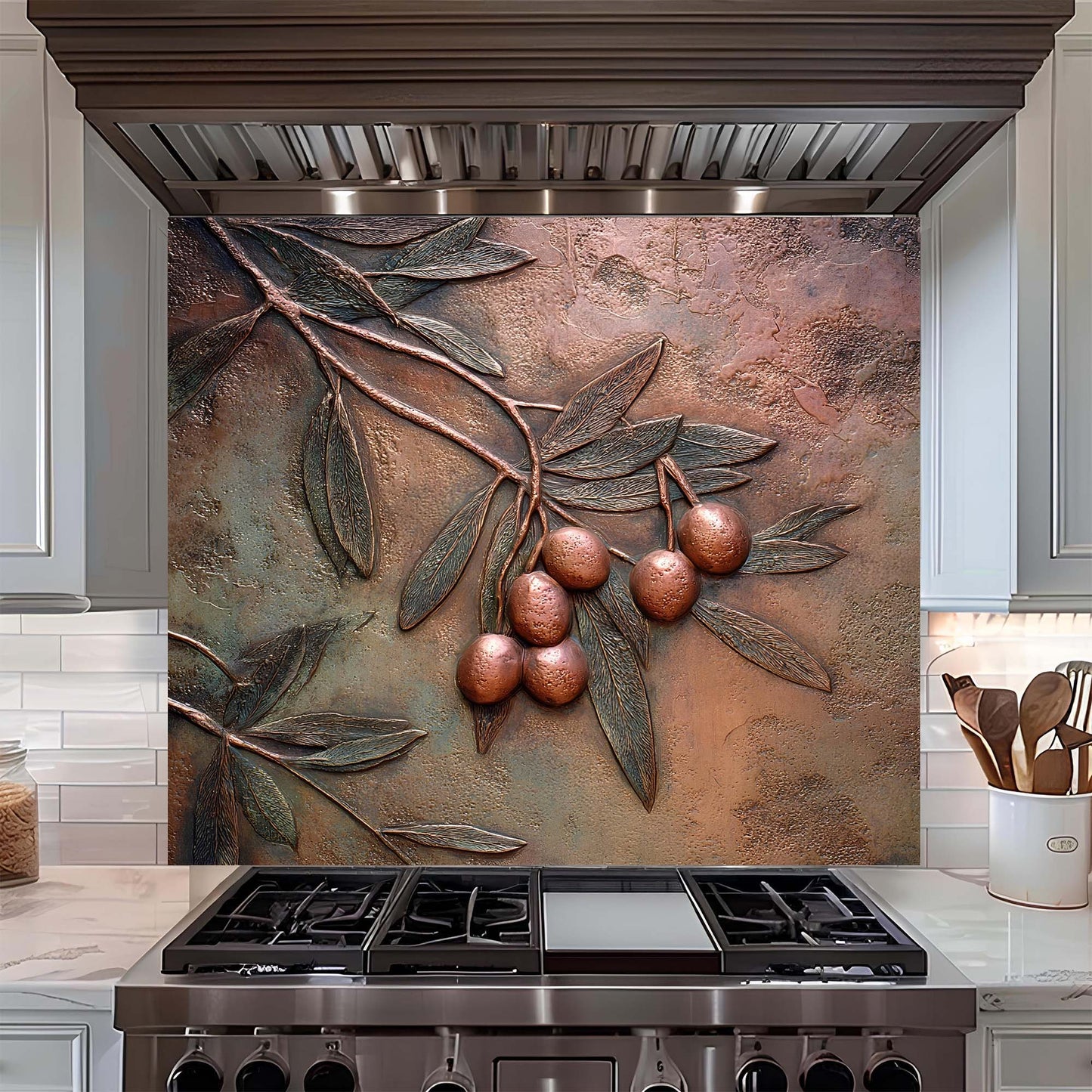 Decorative backsplash with leaf and berry design above a stove in a kitchen.