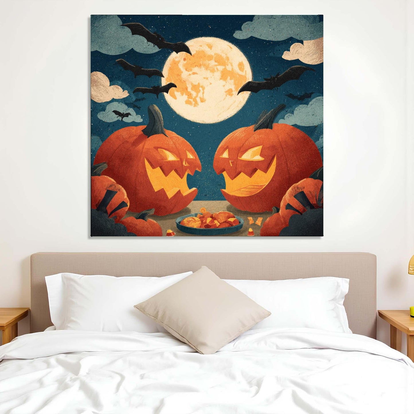Halloween-themed wall art above a bed with pumpkins and a full moon.