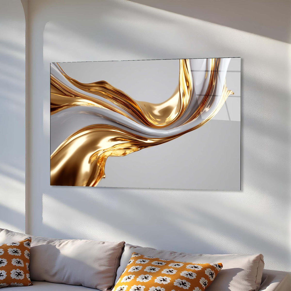 Abstract art piece with gold and white design on a wall above a sofa.