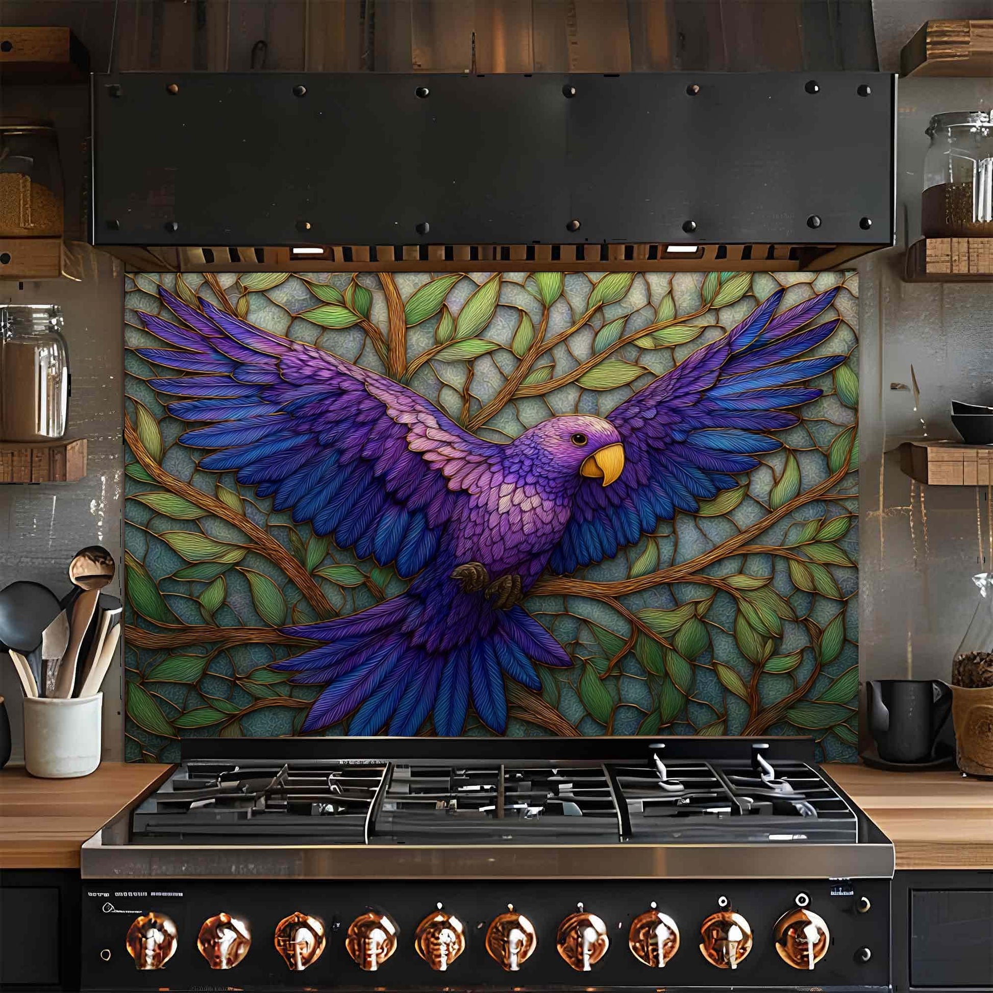 Stainless steel stove with a colorful parrot glass backsplash on the wall above it.