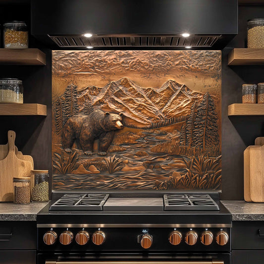 Stainless steel stove with decorative mountain and bear backsplash in a kitchen setting.
