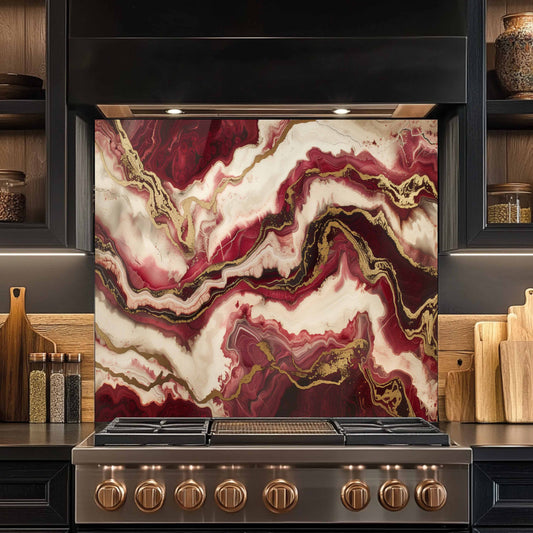 Stainless steel stove with marbled backsplash in a kitchen setting