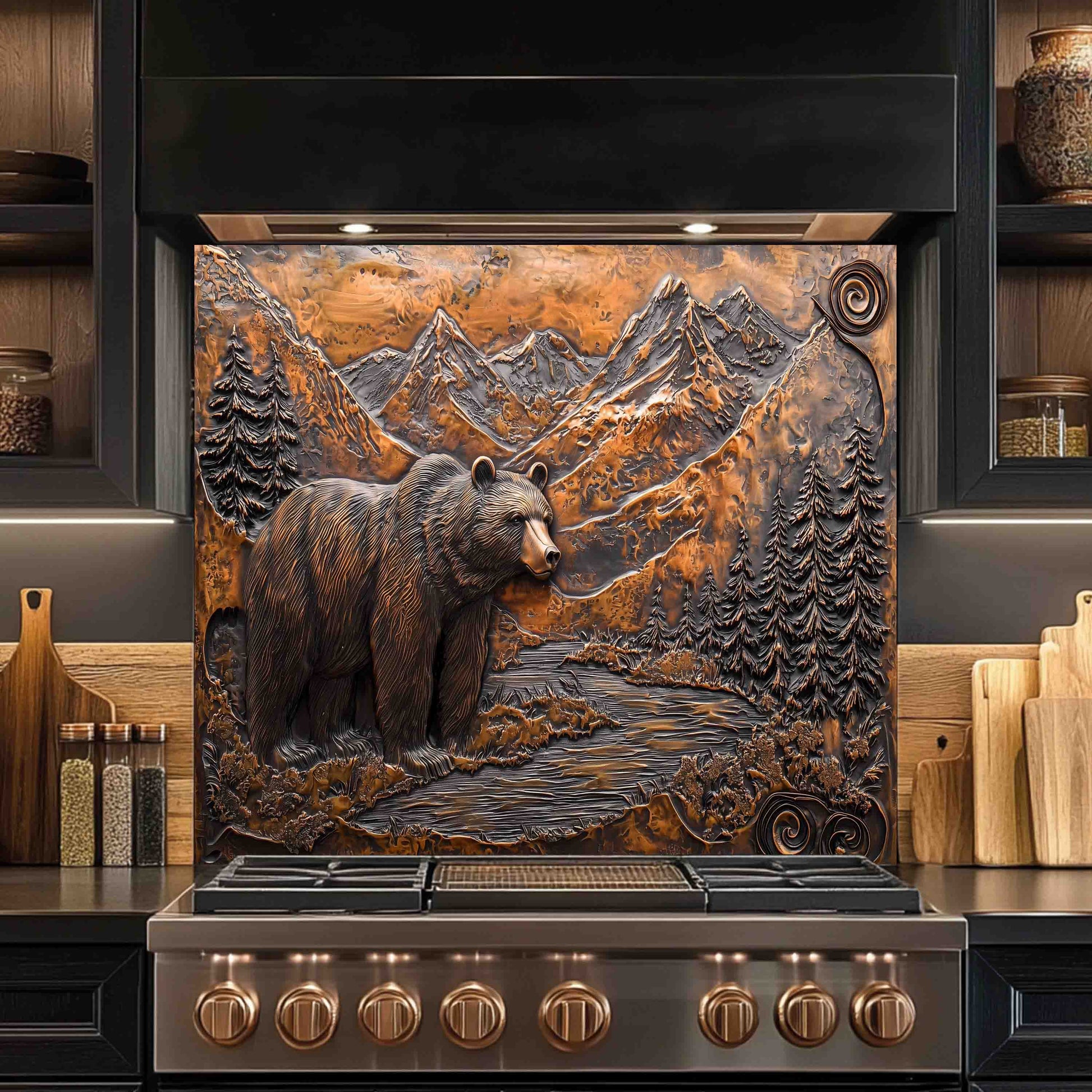 Stainless steel stove with decorative mountain and bear design on the glass backsplash