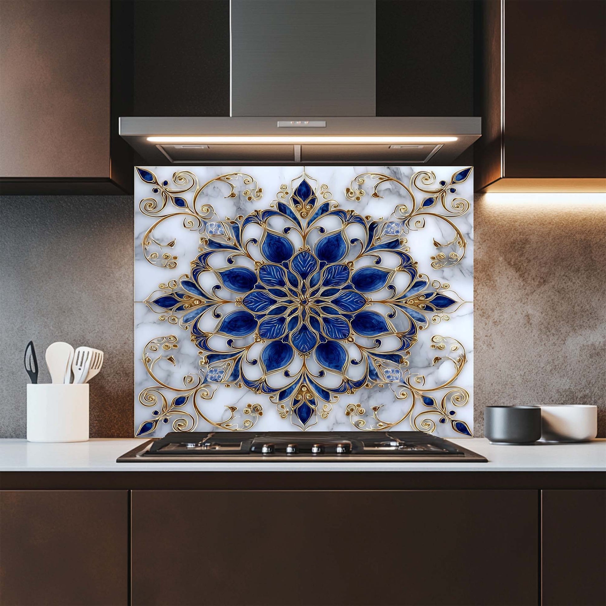 Decorative blue and gold floral pattern on a kitchen backsplash