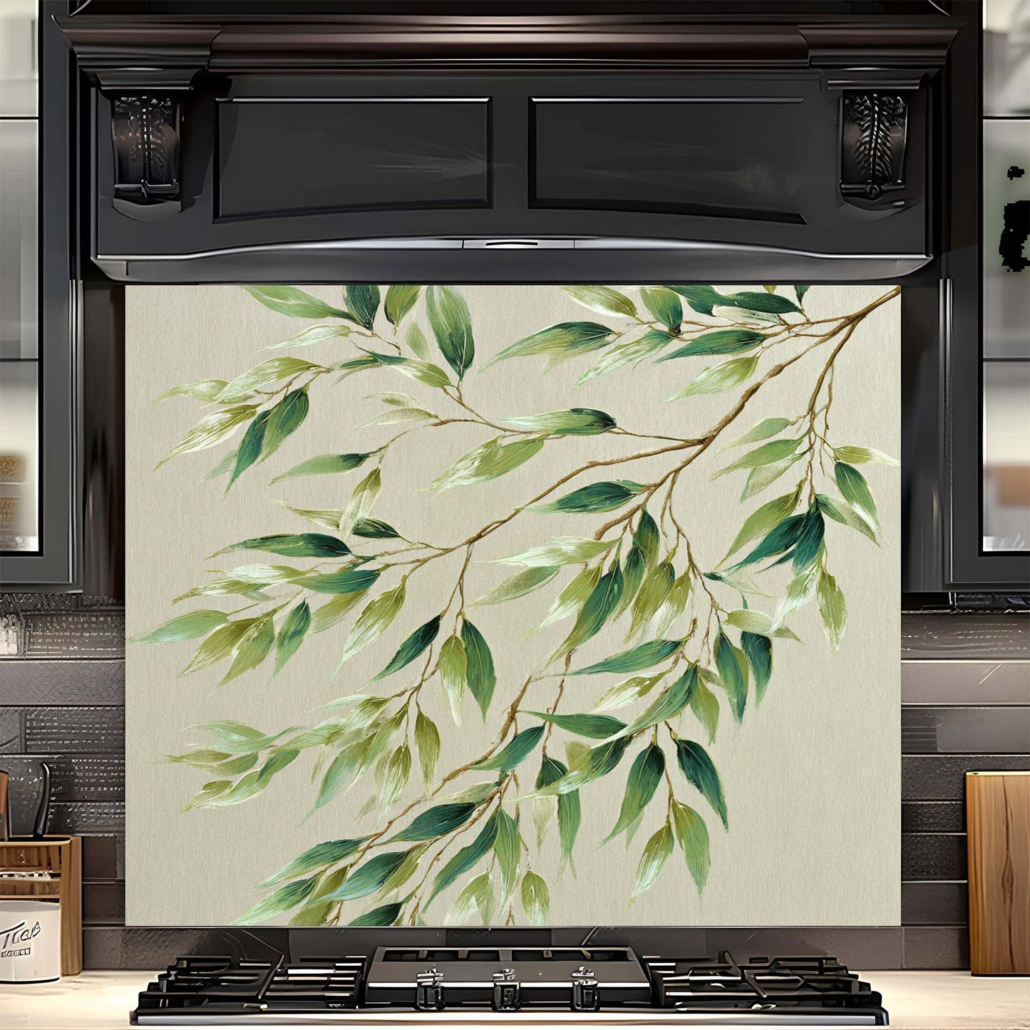 Stainless steel oven with decorative green leaf design backsplash on the front