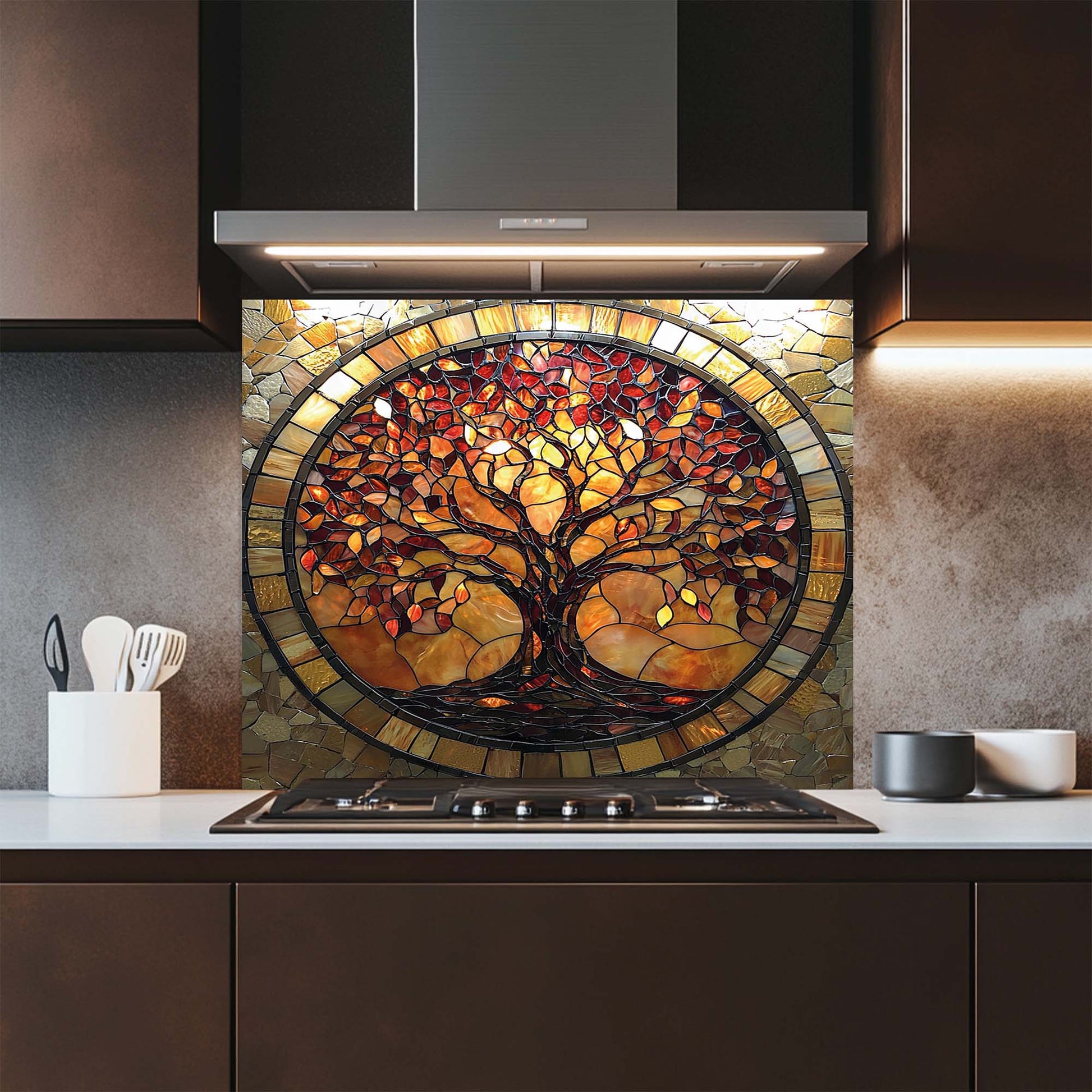 Kitchen with a decorative glass backsplash featuring a tree design.