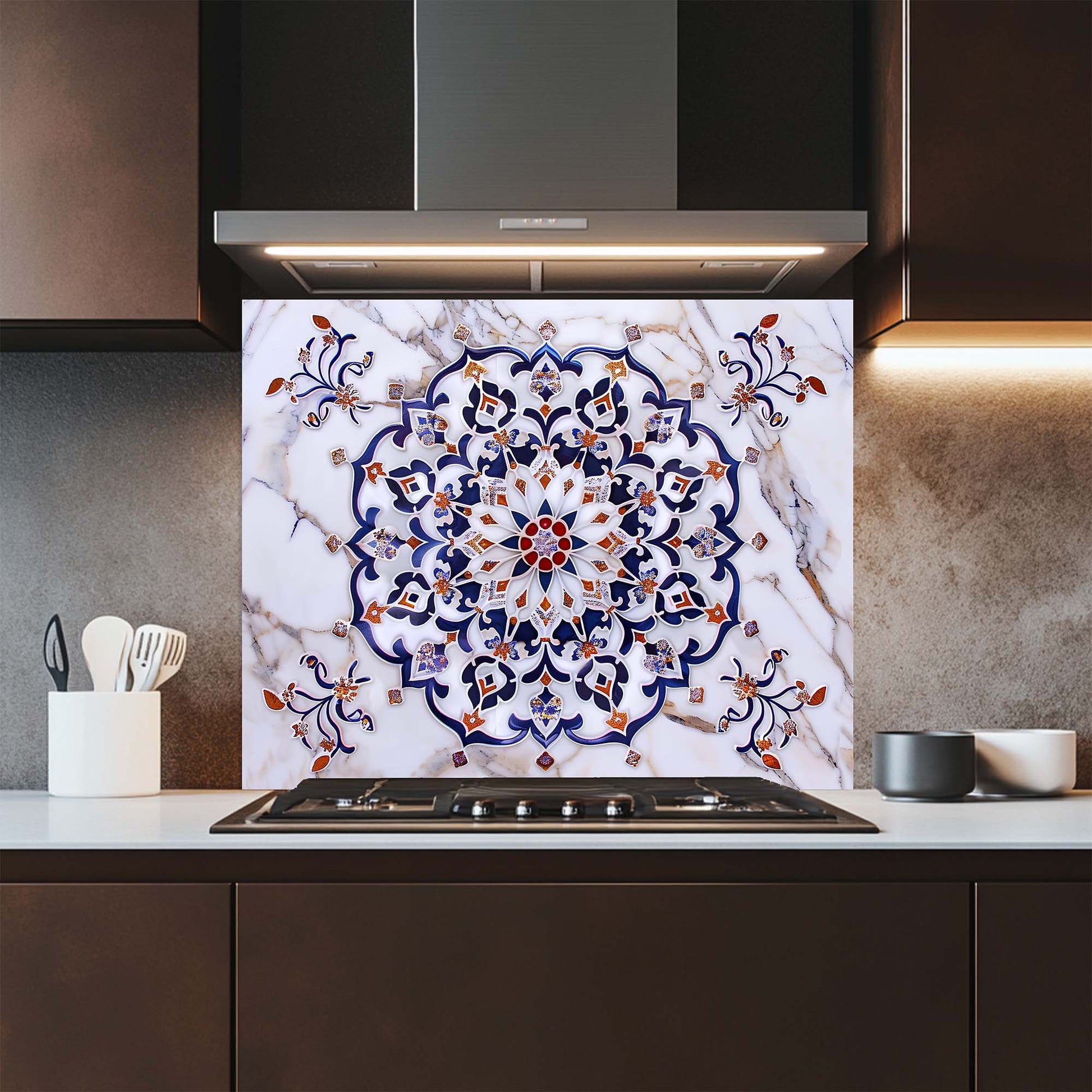 Kitchen with a decorative glass backsplash featuring a floral pattern on a marble background.