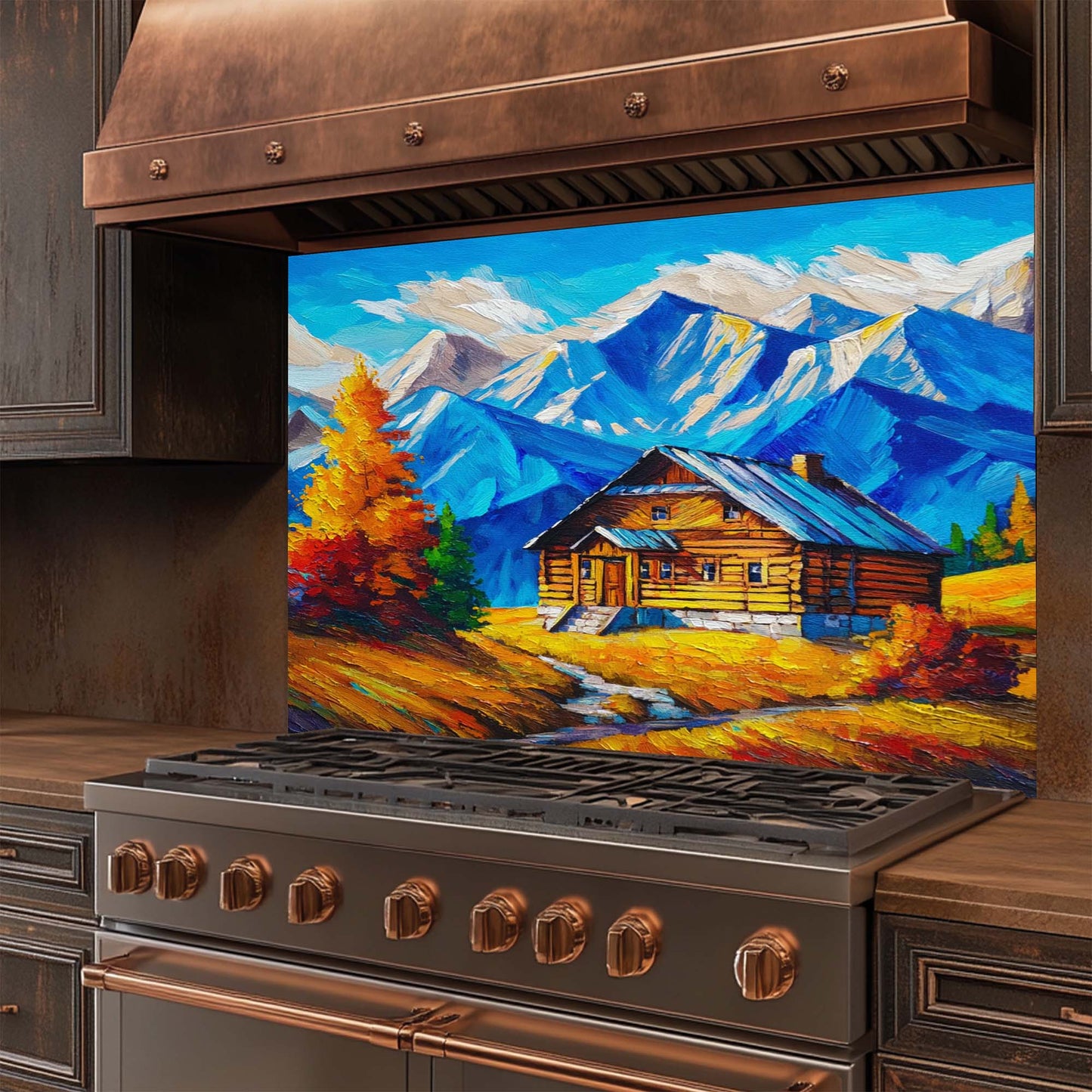 Stainless steel stove with a decorative glass backsplash  featuring a mountain scene.