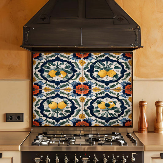 Decorative tile glass backsplash with floral and lemon pattern above a stove in a kitchen.