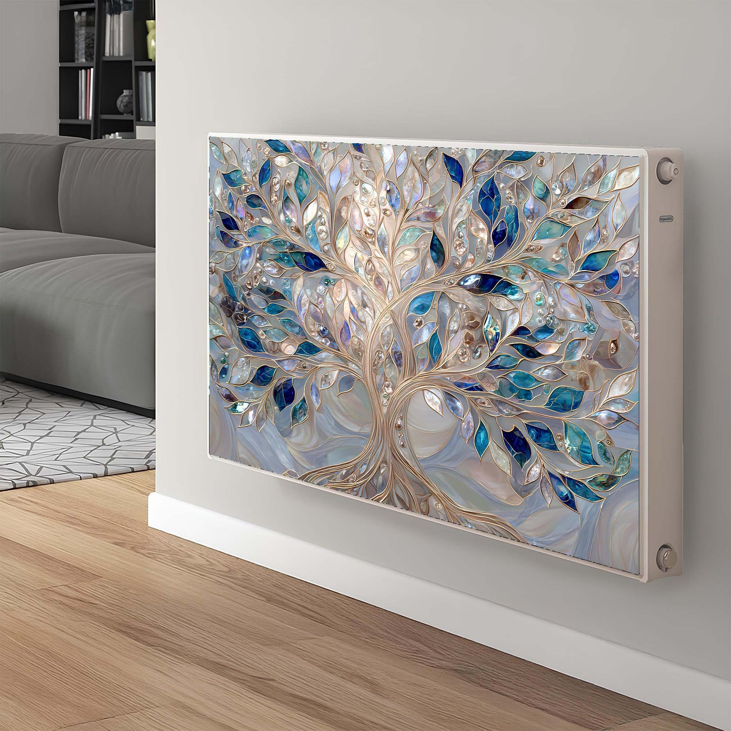 Decorative magnetic radiator cover with tree design on a white wall in a living room.