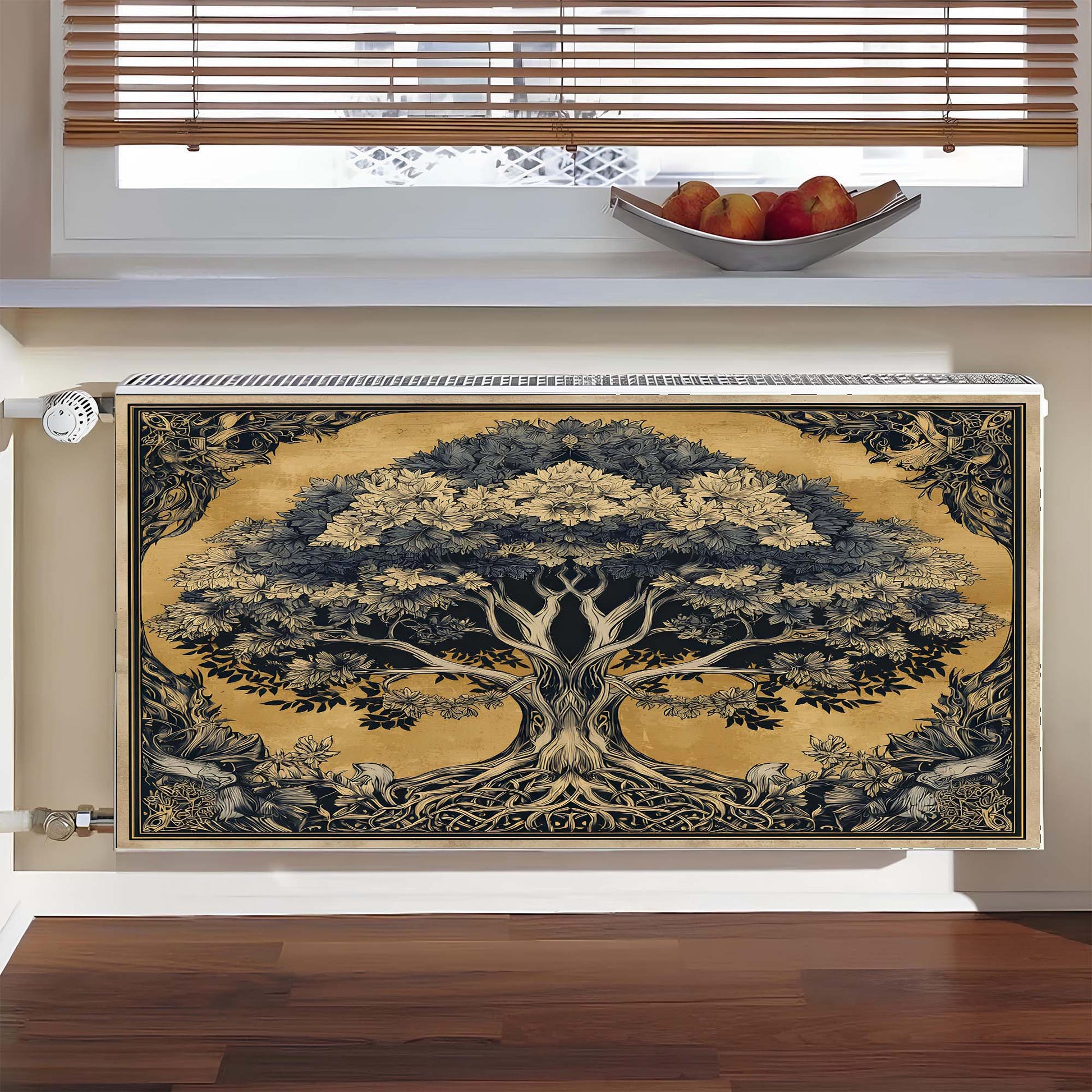 Decorative radiator cover with tree design in a room.