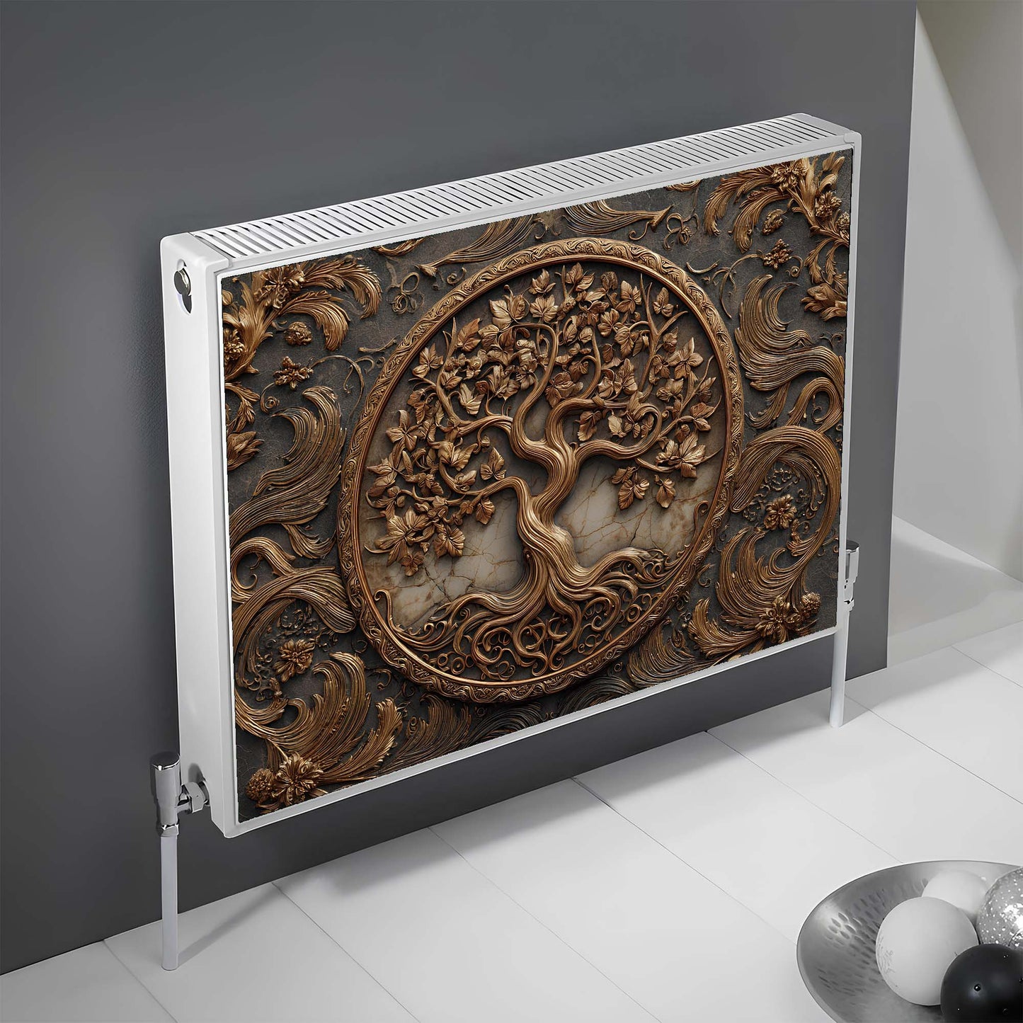 Decorative magnetic radiator cover with intricate tree design on a gray wall.