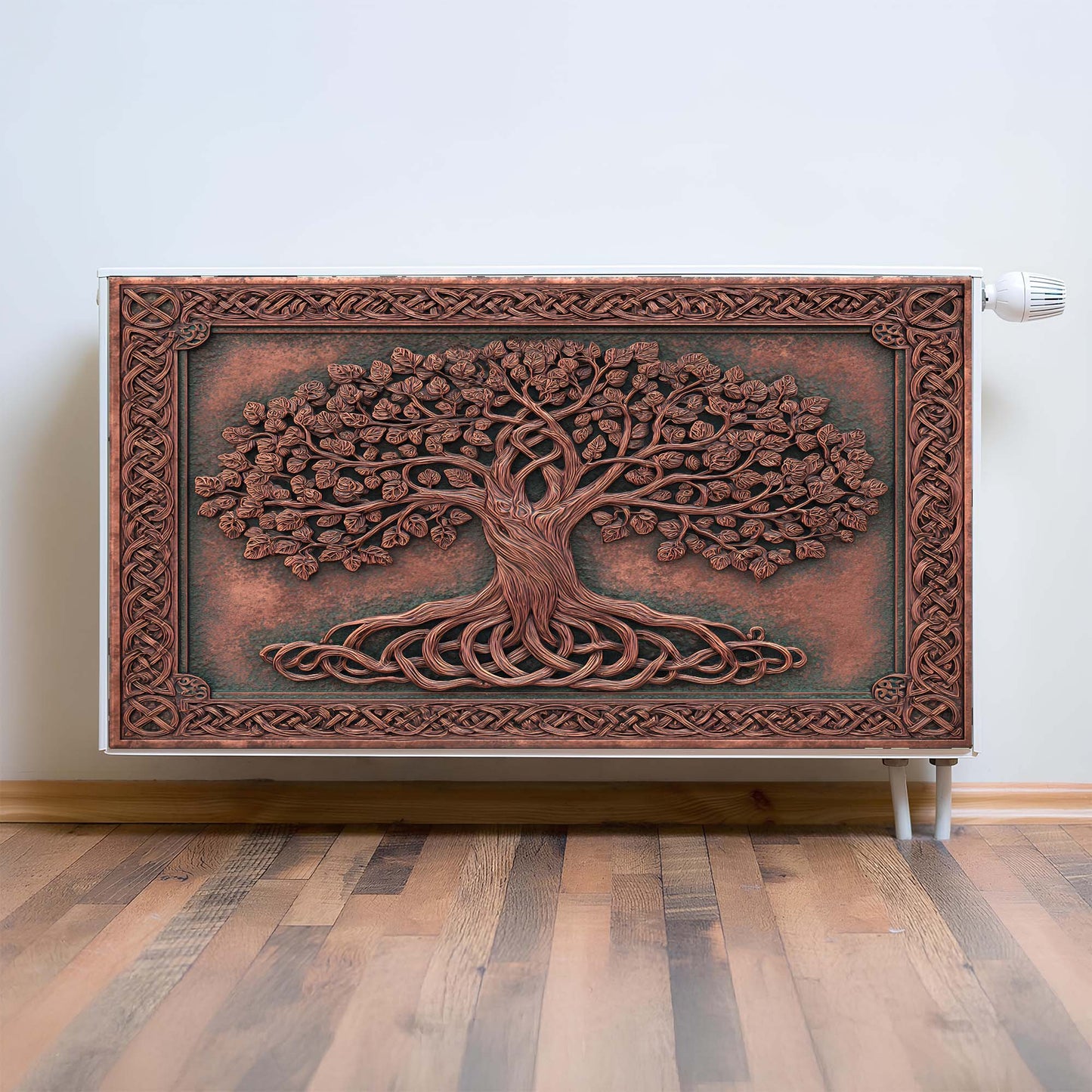 Decorative magnetic radiator cover with tree design on a wall.