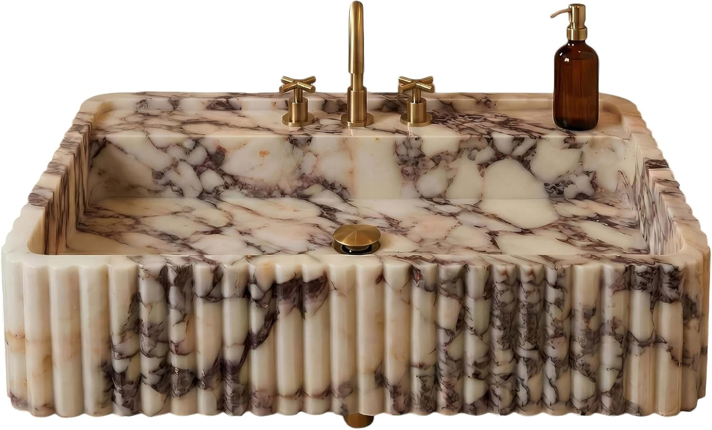 Marble calacatta viola sink with gold faucet and soap dispenser on a white background