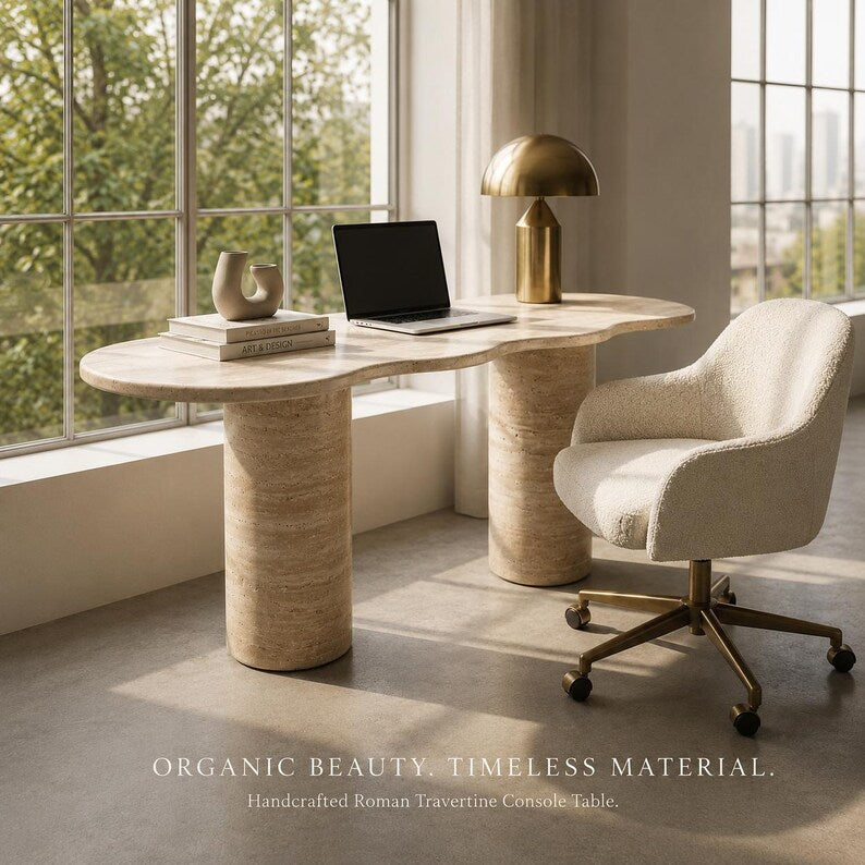 Modern office setup with a marble console table, chair, and laptop.