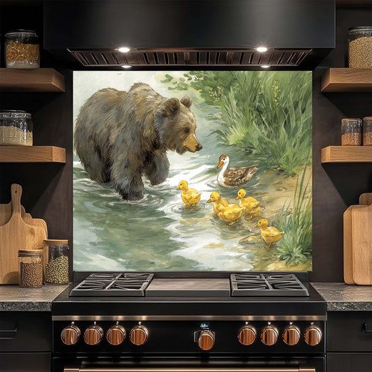 Kitchen stove with a decorative glass backsplash featuring a bear and ducks