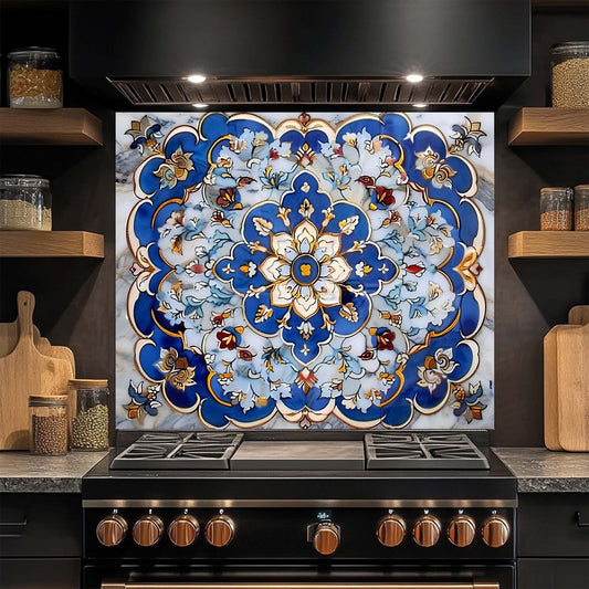 Decorative glass backsplash with intricate blue and white pattern above a black stove in a kitchen.