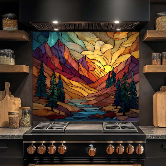 Stylized mountain landscape on a kitchen backsplash above a stove.