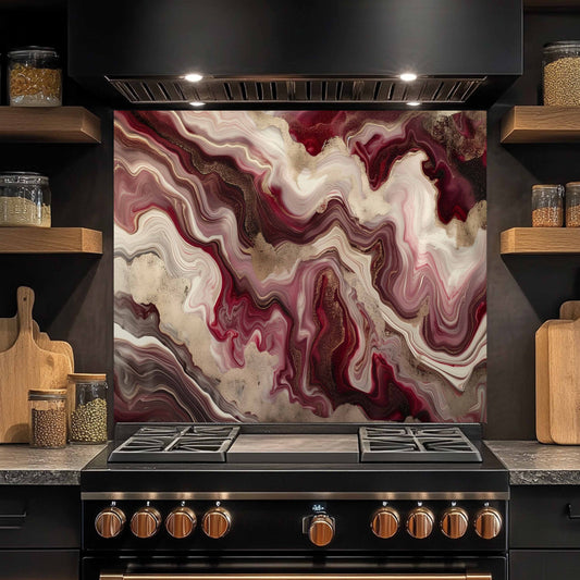 Stainless steel stove with marbled backsplash in a kitchen setting
