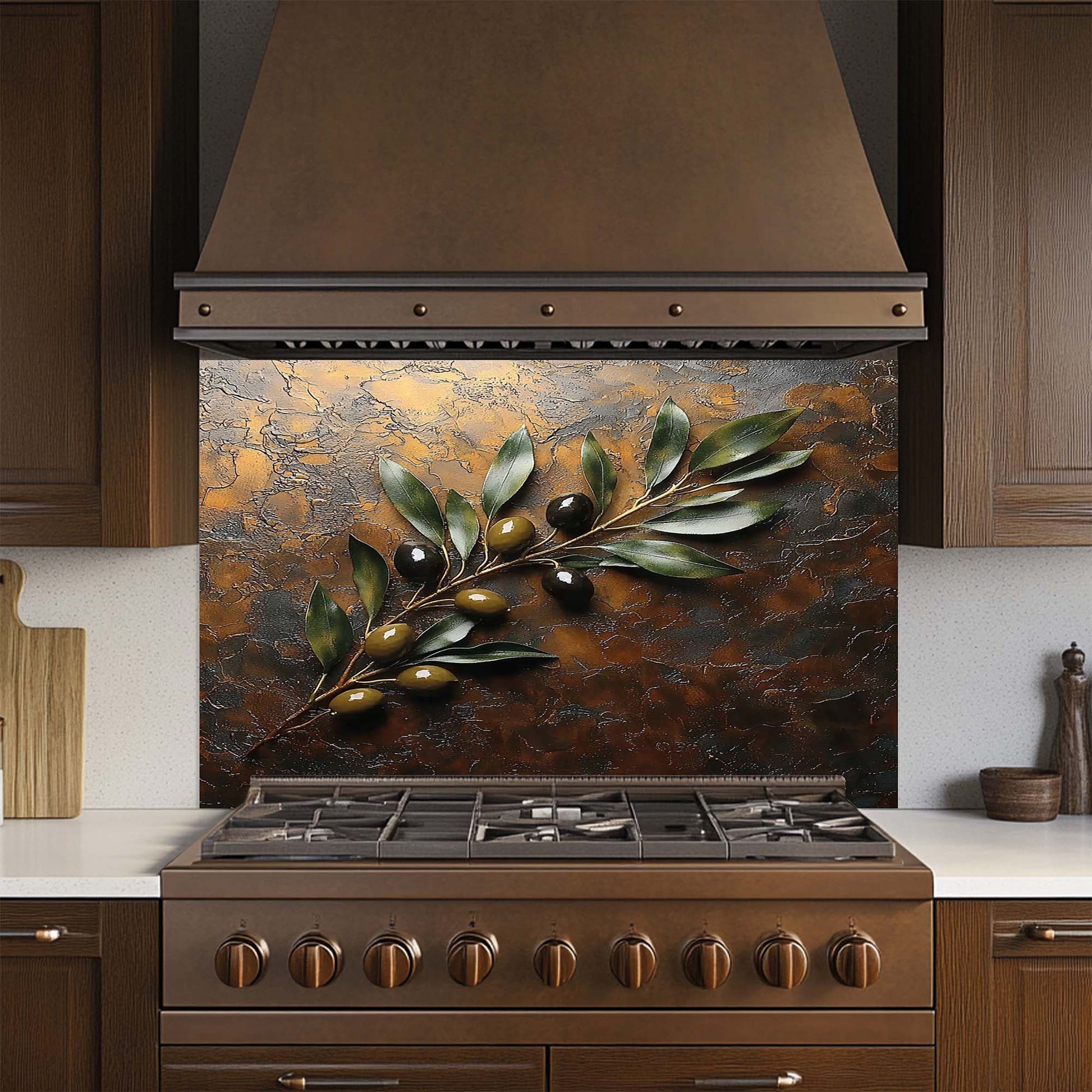 Kitchen stove with decorative glass backsplash featuring olive branch design