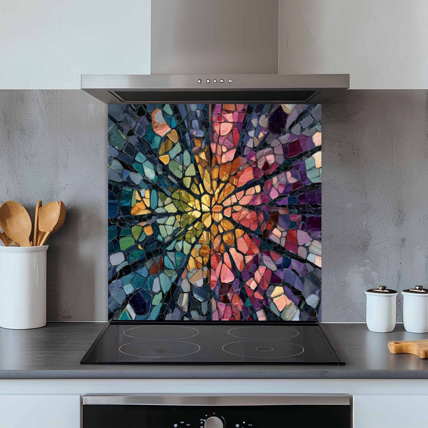 Colorful mosaic glass splashback behind a stove in a kitchen