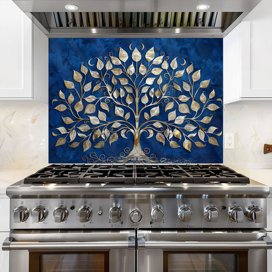 Stainless steel stove with decorative glass splashback featuring a tree design on a blue background.