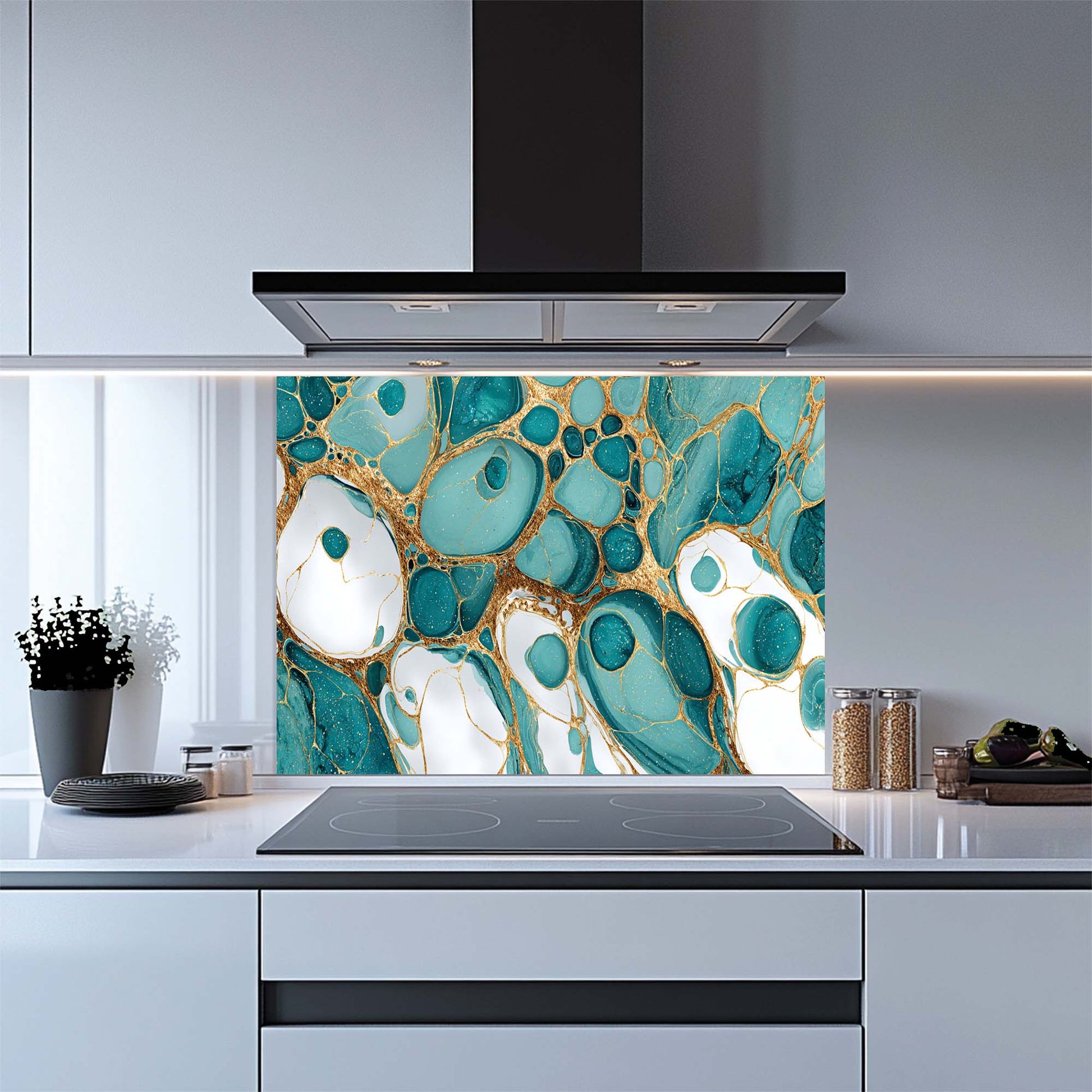 Kitchen with a decorative glass splashback featuring abstract teal and gold design.