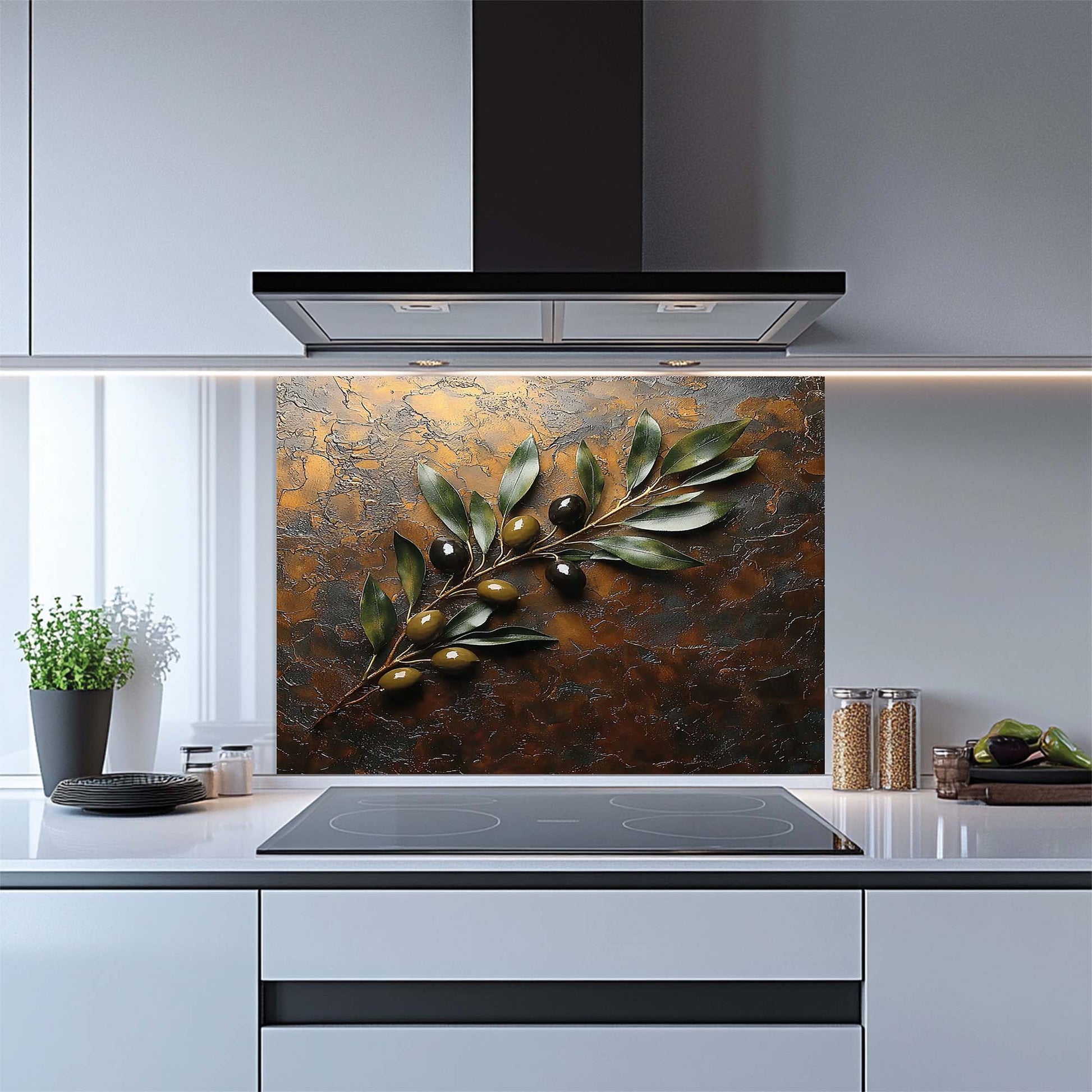 Kitchen with a decorative glass splashback featuring an olive branch design.