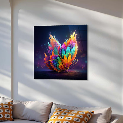 Colorful abstract art piece on a wall above a sofa with patterned cushions.