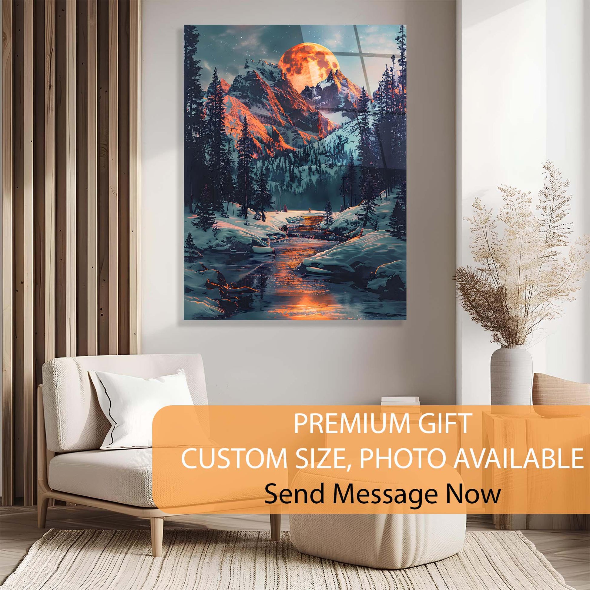 Framed mountain landscape painting in a living room setting with a sofa and decorative elements.