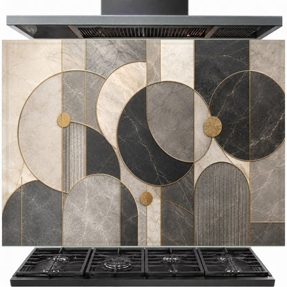 Geometric luxe tempered glass backsplash installed behind a modern gas stove in a luxury kitchen.