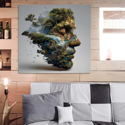 Abstract art of a face made of nature on a wall above a sofa.