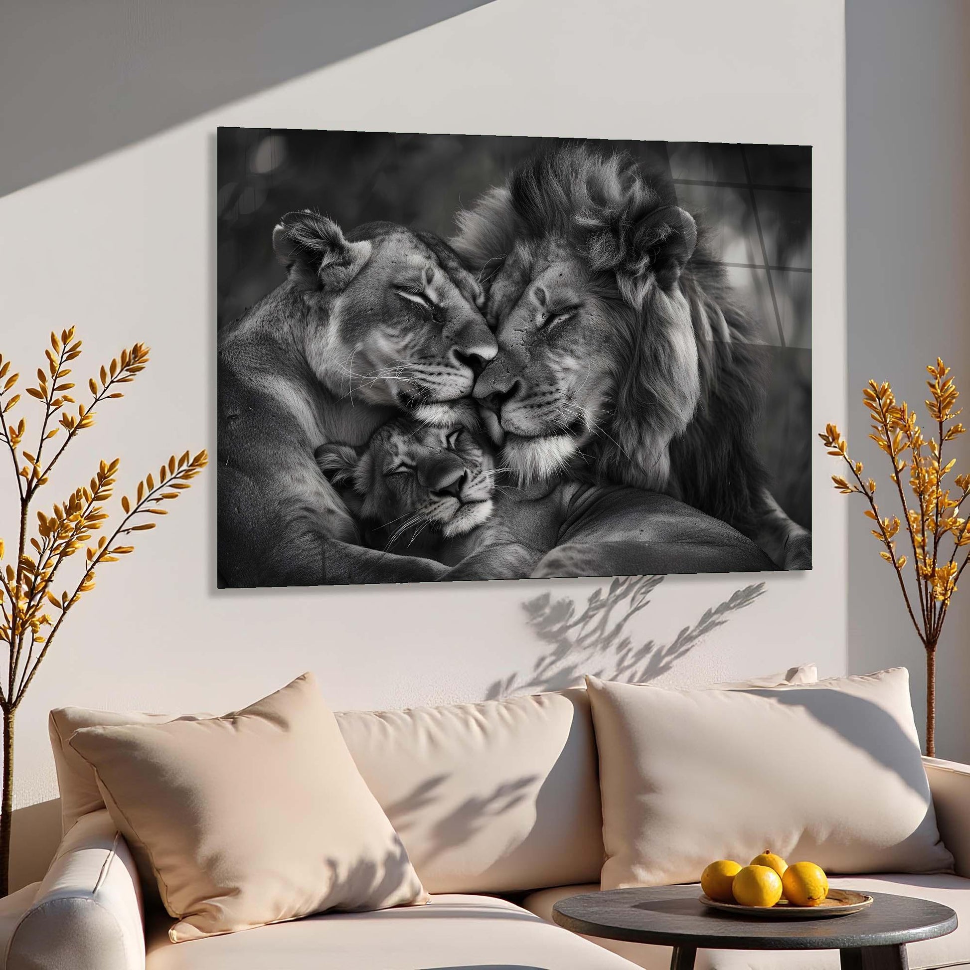 Lions embracing on a wall above a sofa with decorative elements.