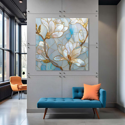 Modern interior with a floral artwork on a wall, blue bench, and orange chair.