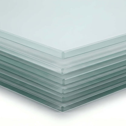 Stack of clear glass panels on a white background
