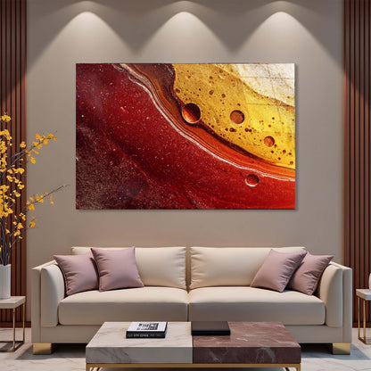 Modern living room with a beige sofa, abstract art on the wall, and decorative elements.
