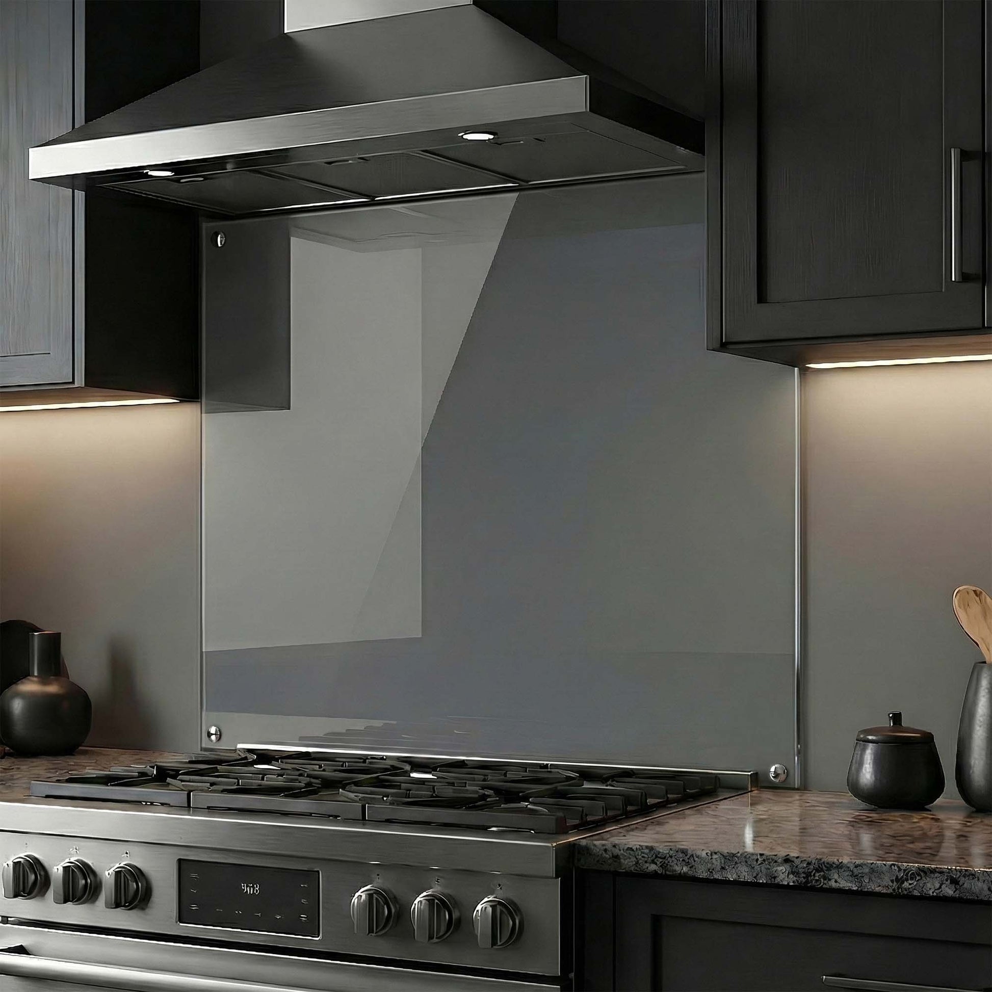 Modern kitchen with stainless steel stove and glass splashback