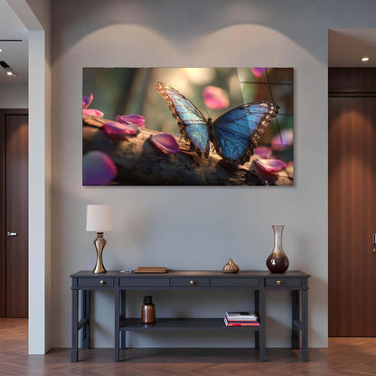 Framed artwork of a blue butterfly on pink petals above a dark wooden console table.