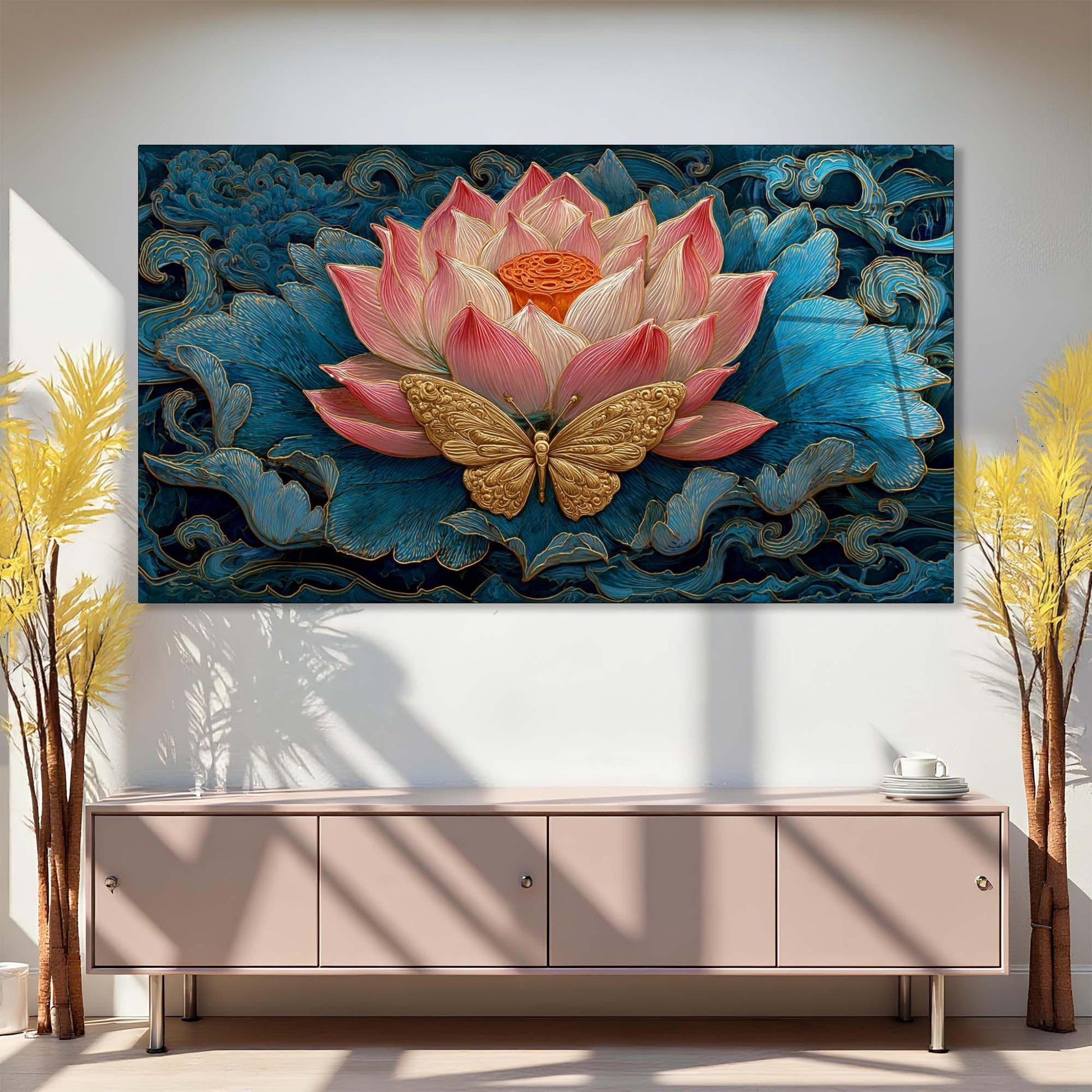 Decorative wall art with a pink lotus flower and gold butterfly on a blue background, displayed above a piece of furniture.