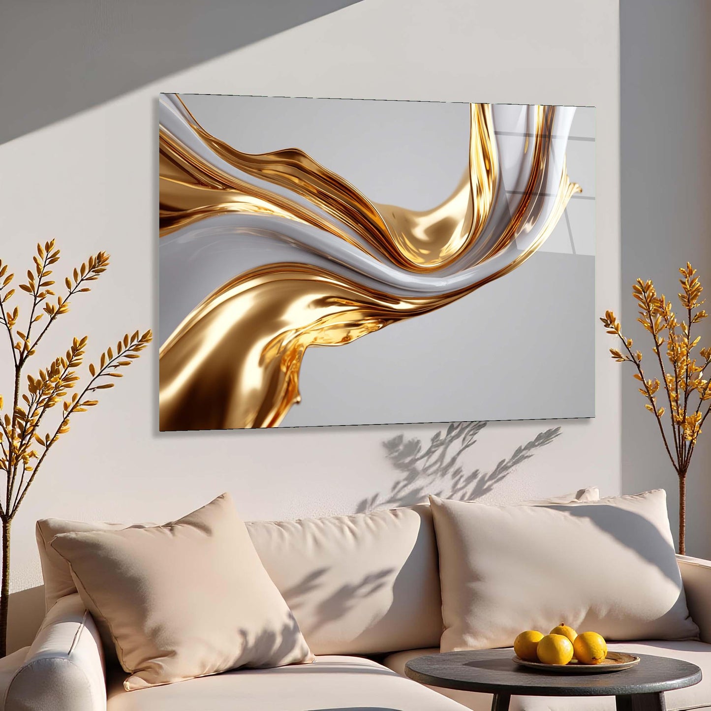 Abstract gold and white painting on a wall above a beige sofa with decorative pillows.