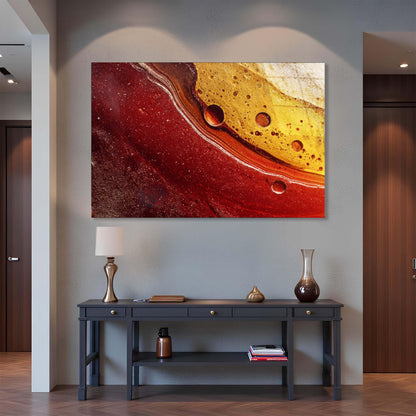 Artistic depiction of a celestial body on a wall above a console table with decorative items.