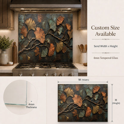 Sleek tempered glass backsplash with metallic ginkgo motif in a contemporary kitchen island
