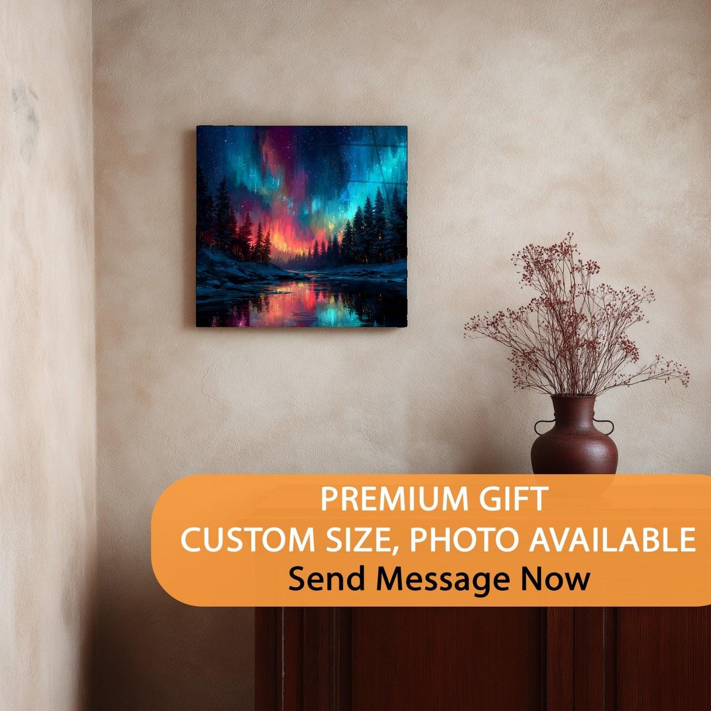 Canvas print of a colorful landscape hanging on a wall with a vase below.