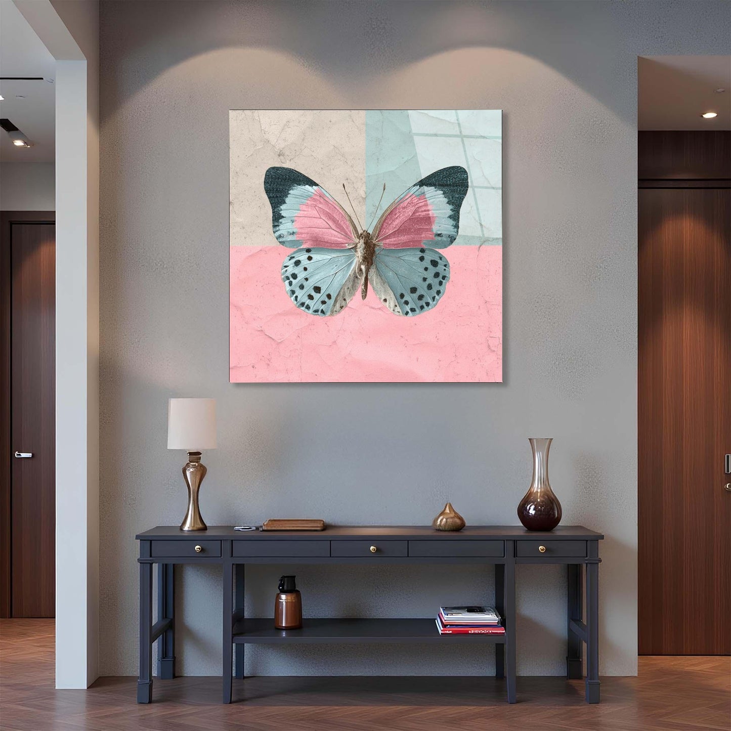 Butterfly artwork on a wall above a console table with decorative items.