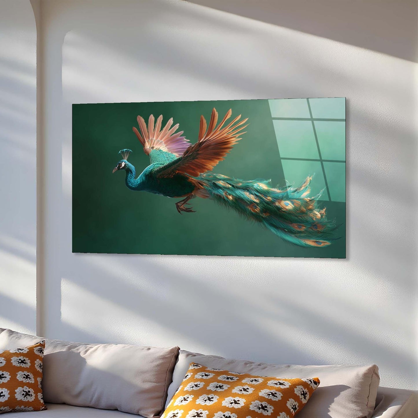Peacock painting on a wall above a sofa with decorative pillows